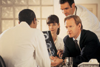 Photo of a couple meeting with a doctor