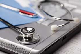 Picture of Laptop and Stephoscope